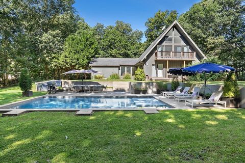 This private home is situated on a peaceful street, just a short stroll away from Gurneys and a few minutes from downtown Montauk. Just short of an acre, it offers 4 bedrooms, a stunning gunite pool, and a beautifully landscaped backyard. Upon enteri...