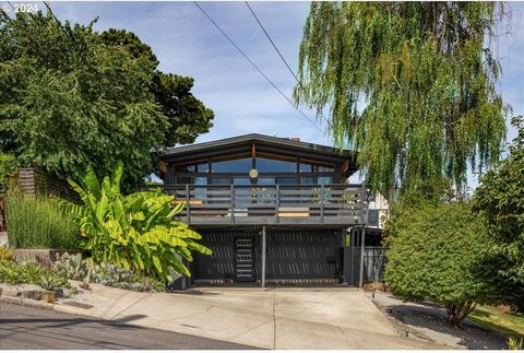 Refined mid-century modern home perfectly situated on a quiet street on Mt Tabor, with stunning views of Mt Hood and the popular Mt Tabor neighborhood. Timeless design merges seamlessly with modern living all within steps of an extensive trail networ...