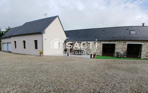 Maison familiale de plain pied en pierres avec 6000 m² de terrain et plan d'eau