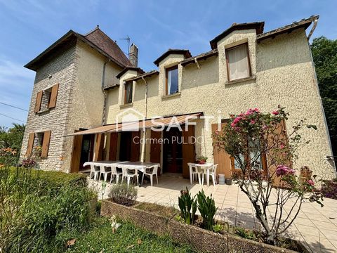 Maison de charme : 7 chambres, garage, jardin et piscine dans un environnement paisible à proximité des comoditées.