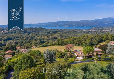 This modern luxury estate with a pool is for sale in the province of Varese, in a charming panoramic position that embraces Lake Maggiore and the town below it. This recently-built luxury property is surrounded by a lovely 2,000-sqm leafy garden, off...