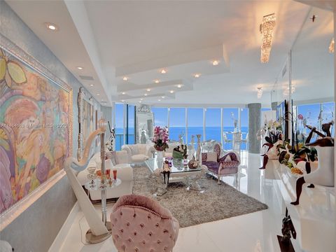 Experience The Epitome Of South Florida Beach Living in This Luxurious Oceanfront Property in Trump Hollywood. Perched On The 12Th Floor With A Private Elevator Foyer, This Spacious Residence Boasts Over 3,062 Sqft Of Living Space. Floor-To-Ceiling I...
