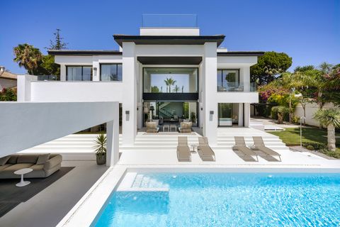 Welcome to Villa Harmonia, a stunning 6-bedroom masterpiece located just 200 meters from the beach in the sought-after area of Cortijo Blanco, nestled between Puerto Banus and San Pedro. Prepare to be captivated by the sea views that grace every leve...
