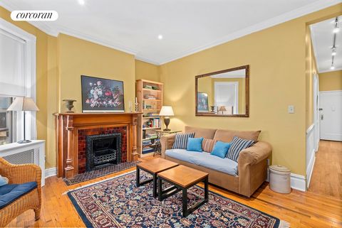 Serenity is yours! Up one flight from exciting Vanderbilt Avenue is this charming one-bedroom apartment. A long hallway is the perfect photo/art gallery and leads into a beautiful living room with high ceilings, crown moldings and an ornate decorativ...