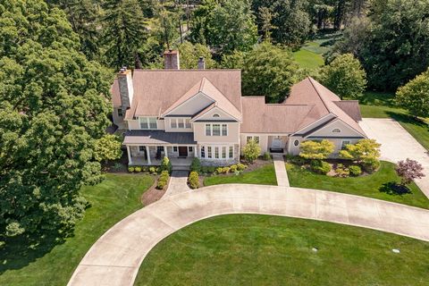 Situated on a pristine, 1+ acre lot in Pepper Pike, this elegant colonial provides over 8,000 square feet of living space with exquisite details throughout. A modern take on a classic Shaker Heights manor, this home provides the perfect blend of upsc...