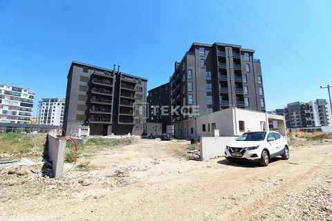 Appartementen met overdekte parkeergelegenheid in Bursa Nilüfer De wijk Hasanağa is een van de snelst ontwikkelde regio's in Bursa, Nilüfer. Met zijn geplande en moderne structuur is de regio zeer geliefd bij gezinnen en studenten. ... liggen dicht b...