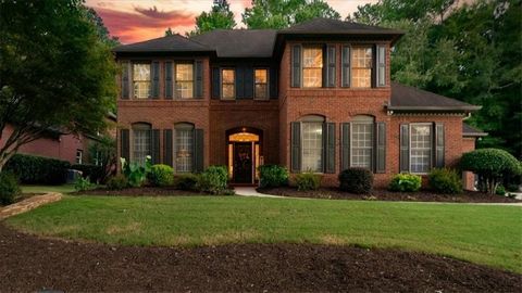 Discover your dream home at 3920 River Hollow Run, nestled in the highly desirable Gran River Subdivision in Peachtree Corners, GA. This home is located across the street from your private neighborhood access to the Chattahoochee River. You'll find i...