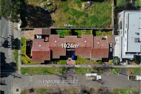 Exceptional investment opportunity in a highly sought-after location! This solid, red brick complex features a total of four 2-bedroom, 1-bath units. This property offers a unique opportunity with the potential for impressive returns. Set on a genero...