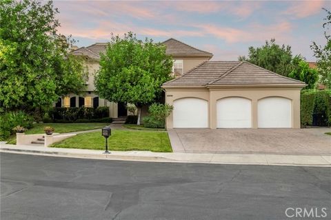 Perched atop Mulholland Gateway Park in the prestigious gated community of Braemar Estates, this stunning 5-bedroom, 4.5-bathroom home sits on half an acre, close to the Braemar golf course and hiking trails. Featuring high ceilings in the foyer lead...