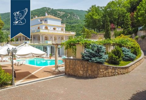 In Subiaco, an enchanting place just 50 km from Rome, there is this exclusive villa surrounded by nature for sale. Currently a luxurious venue for events, ceremonies, and film sets, this villa offers two splendid swimming pools, one indoor and one ou...