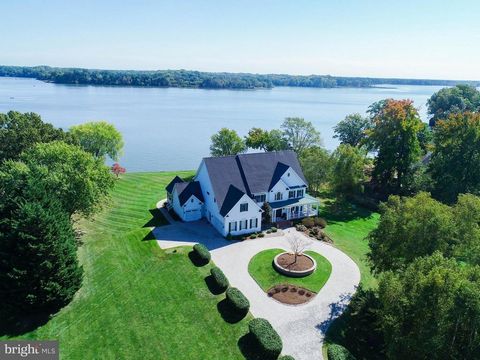 Reduced! Welcome to an unparalleled waterfront retreat where luxury living meets the serene beauty of the Wye River. This property, situated on over 2 acres of land directly across from Wye Island, offers a lifestyle of opulence and relaxation. With ...
