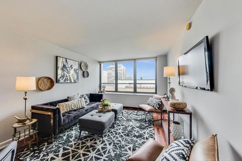 This Large 2-bedroom, 1-bathroom condo located across from Lakeshore park and the MCA! A bright and inviting living area boasts large windows that flood the space with natural light. Hardwood flooring in entry, Kitchen and Living spaces with carpeted...