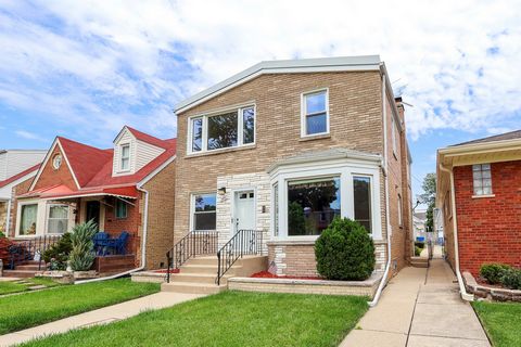 Very unique opportunity in the Hiawatha Park area of Chicago's northwest side. First time on the market in over 40 years! This well cared for property is perfect for related living or as a rare investment opportunity. It features two spacious 2-bedro...