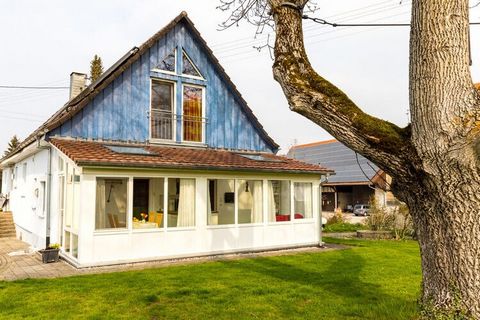 Appartement de vacances moderne et lumineux avec jardin d'hiver avec 2 chambres, grand jardin et terrasse