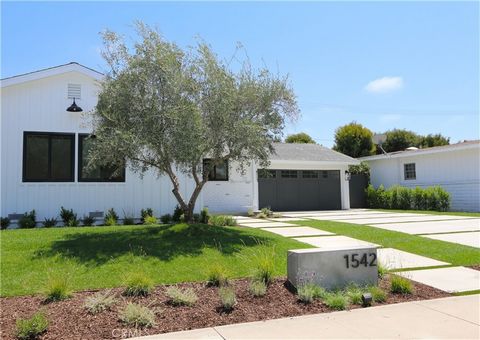 Welcome to 1542 Irvine Avenue, situated in one of Newport Beach’s most sought after neighborhoods. Featuring 3 bedrooms and 2 modern bathrooms, this home has been thoughtfully renovated from the studs. The spacious front yard welcomes you with a larg...