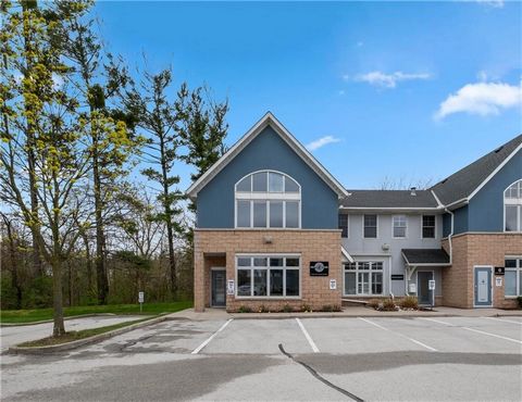 Medical uses permitted. The first unit to be listed for sale at this complex since 2016. This unit is arguable the crown jewel of the complex. It is a corner unit with an abundance of natural light overlooking a wooded area with a patio out back in a...