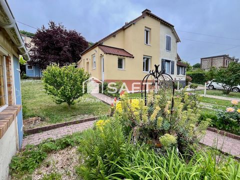 Maison avec jardin, garage et cave
