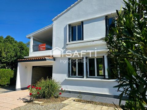 Idéalement située, proche commodités avec jardin et garage