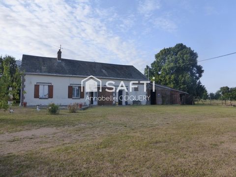 Un cadre champêtre avec terrain plat et dépendances utiles.