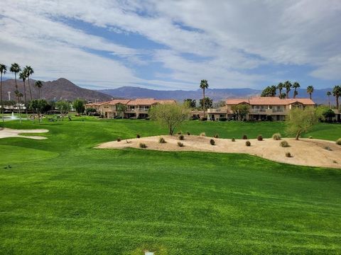 This upper-level property is located close to the Palm Royale Country Club Clubhouse, tennis and pickleball courts. The balcony offers views of the fairways and local mountain ranges. Interior features a great room floor plan with vaulted ceilings. T...