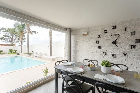Elegant Coastal Retreat This elegant holiday home in Trappeto offers a bright, modern living space with direct access to a private pool and garden. The villa’s spacious living room opens onto a covered terrace perfect for al fresco dining, while the ...