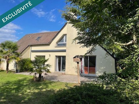 Maison familiale avec garage et jardin