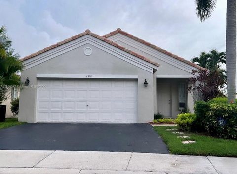 Amazing 3 bed/2 bath single home on a quiet Cul de Sac in the desired gated community of THE RIDGES. This is a bright one story home with lots of light from windows that have accordion hurricane shutters. There is neutral tile throughout. Stainless s...