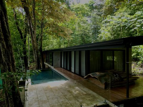 Beautiful Jungle-Enveloped Home Near Santa Teresa Location: Just 10 minutes from the center of Santa Teresa and the beach Description: Discover this stunning two-bedroom, two-bathroom home nestled in the heart of the jungle near Santa Teresa town. De...