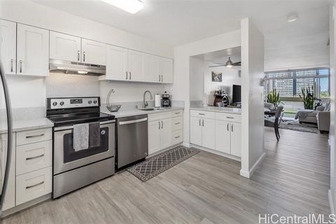 Stunning unit in preferred building w/Diamond Head & park view! Elegant full 2019-2020 remodel, includes the legal removal of popcorn ceilings for a fresh, modern aesthetic. The redesign exudes a sleek Scandinavian vibe w/clean lines, neutral tones &...