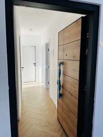 Location: Ličko-senjska županija, Novalja, Novalja. PAG, NOVALJA - Modern apartment in a new building, S5 Modern apartment for sale on the second floor of a newly built building. Price without furniture. The apartment consists of: hallway, kitchen, d...