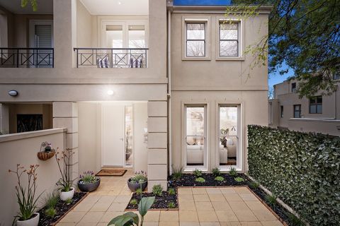 Boasting its own manicured, secure street frontage this impressive townhouse delivers exquisite sized spaces and immaculate, low maintenance convenience in a prized Balwyn pocket, just steps to cafes, dining, parks, cinema and tram. Elevated and priv...