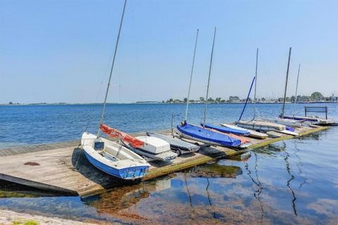 This attractive, bright holiday home is located near the village of Serooskerke in Zeeland in a small-scale holiday park. All homes are built around the car-free playground where children can play to their heart's content in a sandbox, on climbing eq...