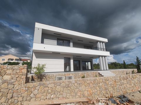 Location: Primorsko-goranska županija, Krk, Linardići. ISLAND OF KRK, wider area of the city of Krk - Luxury villa with a view of the sea On the ground floor there is a living room with a kitchen and a dining room from which there is access to a terr...