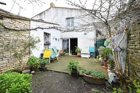 Real estate Ile de Ré, Ars en Ré. An old house in the center of the village occupied by a tenant over 65 years old. The house consists of a beautiful living room with an open kitchen of about 41 m². Upstairs, there are 3 bedrooms and a bathroom. Acce...