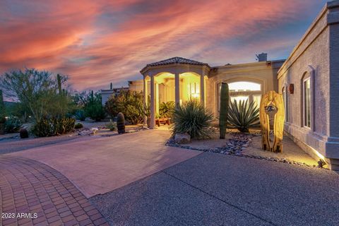 Live the Carefree Lifestyle in this Beautiful Custom Home Surrounded by Natural Desert and Mountain Views! Smart Split Floorplan with Great Room, 3 bedrooms, 2.5 bathrooms, plus a Private Den with separate exit to backyard. Spacious patio areas offer...