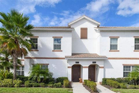 Welcome to a Home Away from Home and a Savvy Investment in ChampionsGate, Florida! Discover the perfect blend of personal comfort and investment potential with this PRISTINE, fully furnished 4-bedroom, 3-bathroom townhome in the sought-after Champion...
