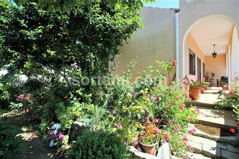 T2 townhouse with stunning views of nature and green spaces, located in the heart of Monchique, The villa consists of two bedrooms, an equipped kitchen, fireplace next to the dining room, a living room, a complete bathroom, covered terrace on the gro...