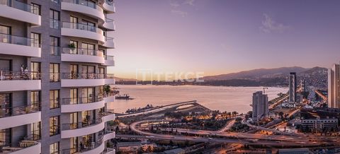 Appartements Dans un Immeuble Résidentiel Près de la Mer à Izmir Konak Les appartements sont situés dans le district de Konak à Izmir, à un endroit qui est le point de rencontre de tous les moyens de transport. Konak est une région située au milieu d...