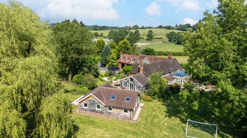 Nestled on the outskirts of the idyllic village of Lowsonford, this exquisite home epitomises countryside charm sitting in approximately 14.3 Acres. This property offers privacy, tranquillity, and the added benefit of equestrian facilities and multip...