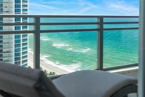 Panoramic OCEAN, INTERCOASTAL AND CITY VIEWS are in abundance from this 26th floor spacious CORNER UNIT located in the exclusive DIPLOMAT OCEANFRONT RESIDENCES. Private elevator access opens into a grandeur foyer with custom double door entry. Open c...