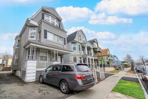 Welcome to this expansive and versatile two-family home, perfectly situated in the heart of East Orange. Offering an ideal blend of comfort and functionality, this property is a dream for homeowners seeking additional income or investors looking for ...