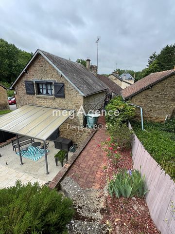 Maison en pierre avec jardin et garages