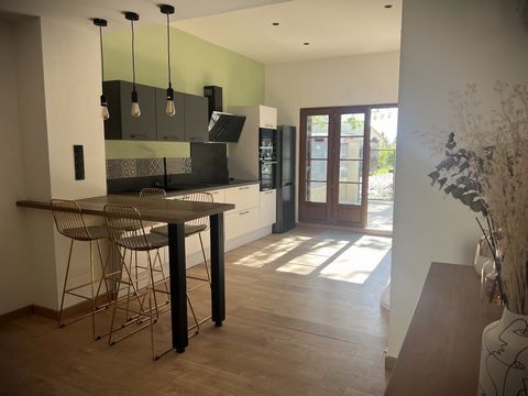 MAISON AVEC COUR-TERRASSE ET PARKING PRIVE