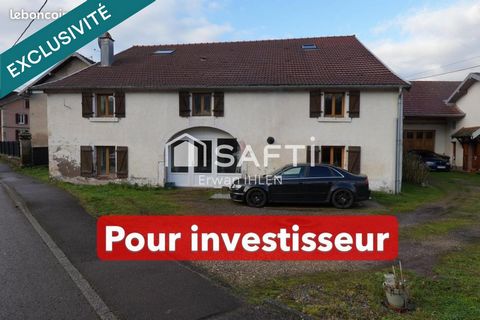 Maison d' habitation, 436m² divisée en 6 appartements.
