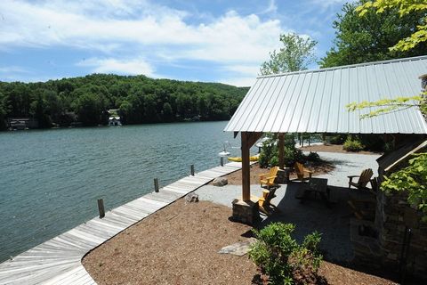 Private Lake Burton access community. Enjoy paved access to the fee simple 3+ acre buildable lot with a designated boat slip at a shared dock on Lake Burton. The shared lakefront common area features a pavilion with outdoor fireplace. Don't miss this...