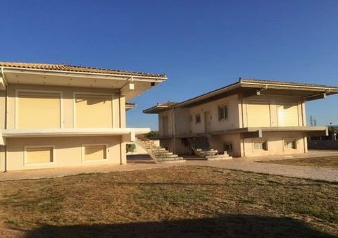 Korinthos. For sale a new (unfinished) residential complex with two buildings 200 sq.m. each. The buildings consists of 2 lrevels –  semi basement and elevated ground floors. Each floor has living room with kitchen, 2 bedrooms, 1 big bathroom, toilet...