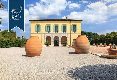 This historical estate near Mantua is for sale. This three-storey estate measures 1,400 m2. The ground floor is home to an entrance hall leading to a living room, a fully-equipped kitchen, two bedrooms, and a bathroom. On the first floor two living r...