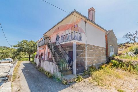 House with two floors, annexes and a small patio located in Pinhal do Norte, municipality of Carrazeda de Ansiães. The villa comprises: R\CH - It is divided in half, leaving two large spaces; 1st floor - Two kitchens; -Pantry; - Four bedrooms; -Livin...