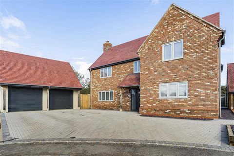 An executive five-bedroom detached property completed earlier this year, with flexible accommodation arranged over three floors, with a workshop, and a double garage with a studio/home office above, finished to exacting standards throughout. An impre...