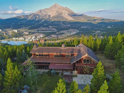 Welcome to your dream retreat in the heart of Big Sky, Montana! This exquisite custom home, nestled amidst the breathtaking landscapes is now available for purchase. Perched elegantly overlooking the majestic Lone Peak Mountain, this remarkable resid...